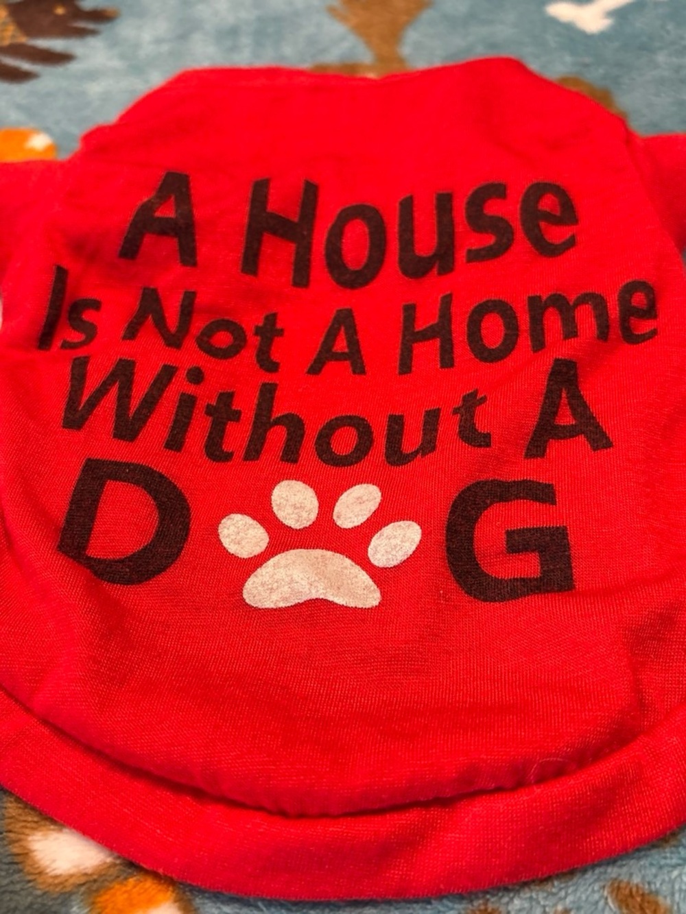 Red Dog Tee with 'A House Is Not A Home' Slogan
